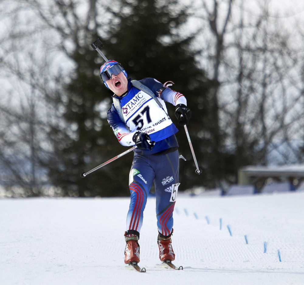 Kamran Husain lets out a yell as he crosses the finish line in Presque Isle on Friday. His experience was similar to that of Russell Currier in 2006 in the same junior world championships at the same venue.