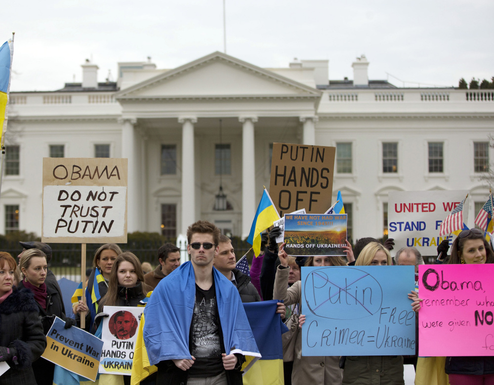 Demonstrators express their sentiments outside the White House in Washington on Saturday. While many are troubled by Russia’s actions in the Crimean Peninsula, there may be little that the West can do to keep it in line.