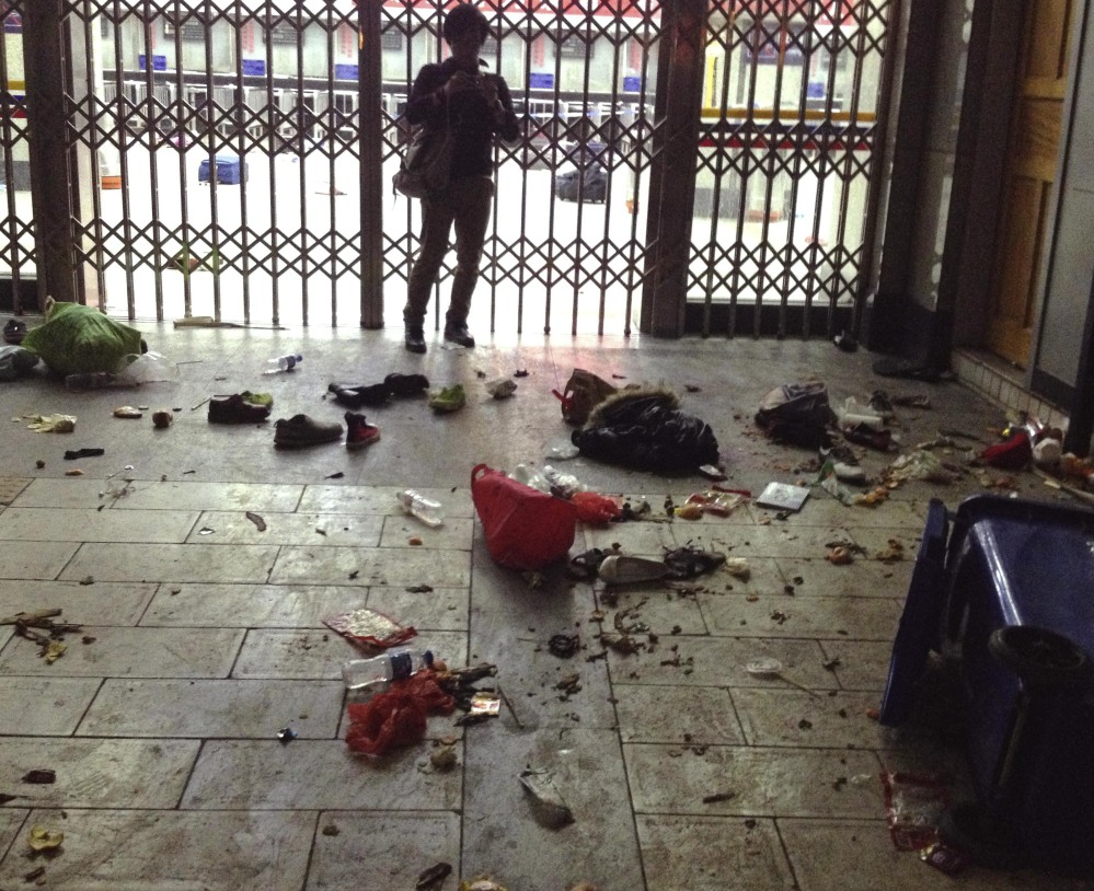 Scattered luggage is seen inside the Kunming Railway Station in Kunming on Saturday.