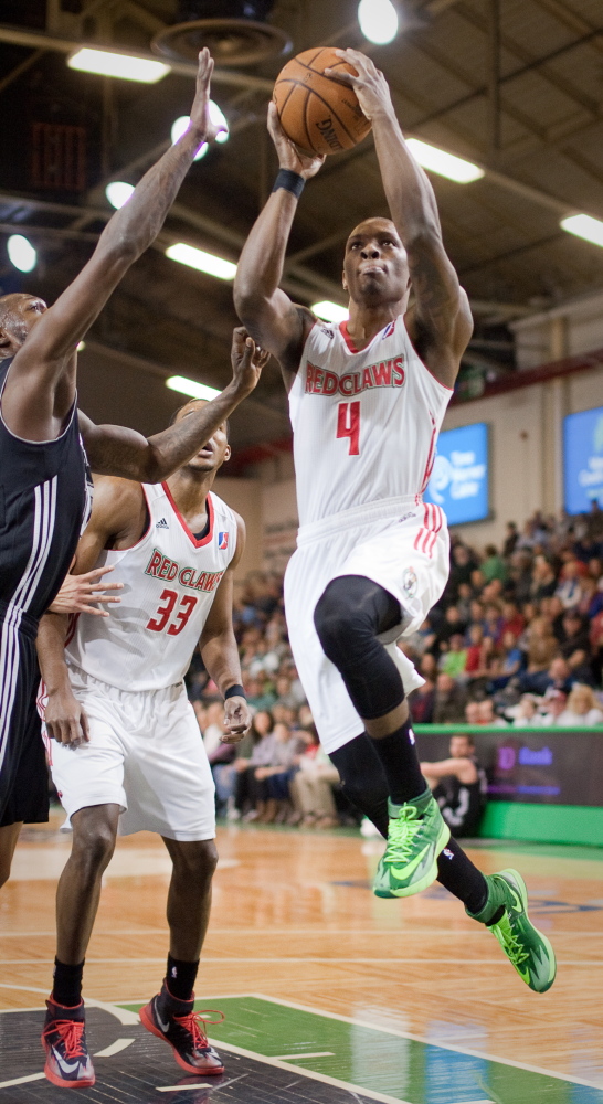Frank Gaines of the Red Claws drives to the basket during Maine’s 113-104 win over the Austin Toros Sunday at the Portland Expo. Gaines scored the last nine Red Claw points, finishing with 22 for the game.