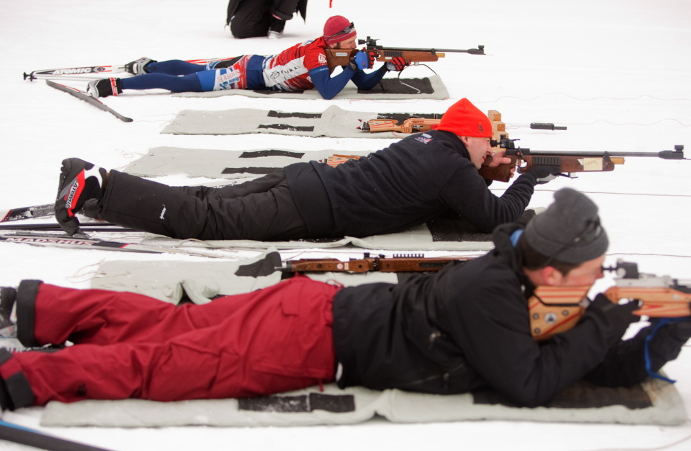 Members of Team Semper Fi target shoot during a biathlon at Pineland Farms in New Gloucester on Sunday. A group of 15 wounded combat veterans participated in the event, hosted by Pineland Farms’ Veterans Adaptive Sports and Training program.