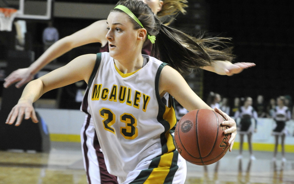 McAuley guard Allie Clement drives to the basket last month.