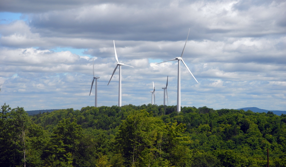 First Wind turbines like these on Stetson Mountain face an uncertain future after the Maine Supreme Judicial Court struck down a joint venture with Emera, the owner of two electric distribution companies. Activists hailed the decision.