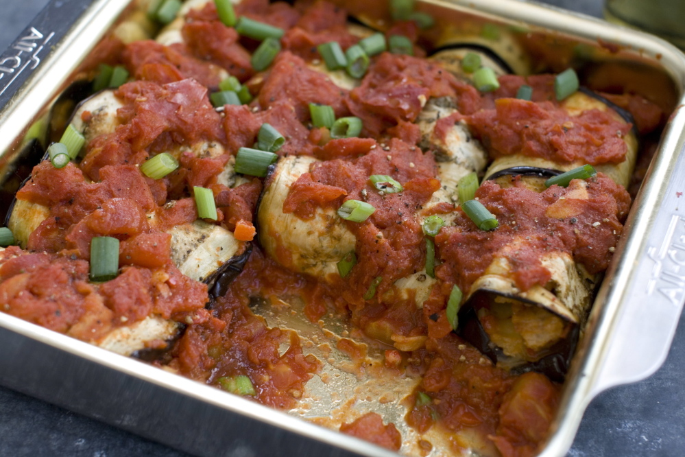 Inside Out Eggplant Parmesan Rolls with speedy marinara sauce makes an excellent centerpiece for a meatless meal.