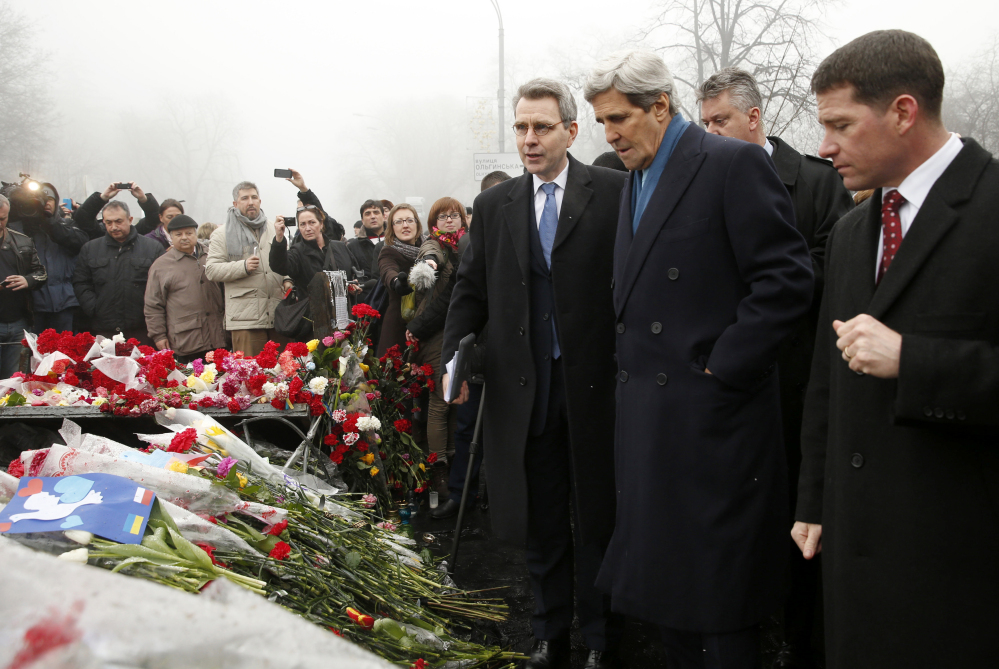 Secretary of State John Kerry visits the Shrine of the Fallen in Kiev on Tuesday. The shrine honors the nearly 100 protesters who have been killed by police over the past several weeks.