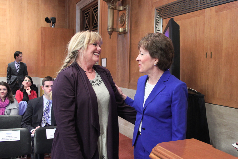 Maine Sen. Susan Collins, at right, speaks with Dixie Shaw of Catholic Charities Maine on Wednesday afternoon before a hearing on elder poverty in the Senate Special Committee on Aging. Shaw runs Catholic Charities’ Hunger and Relief Services program in Aroostook County.