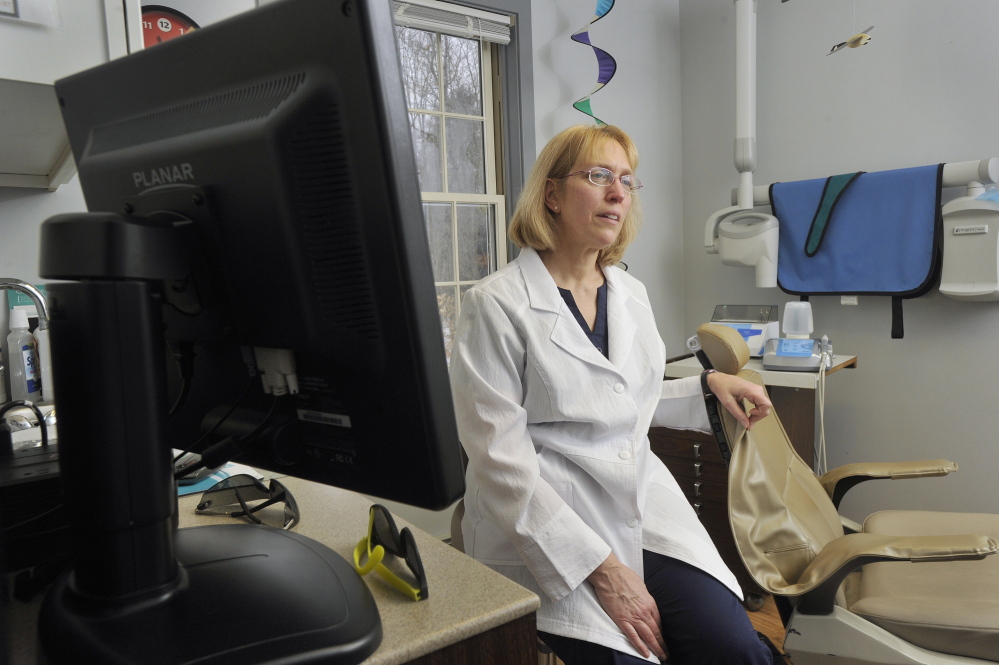 Cathy Kasprak, a dental hygienist who owns her own practice in Bridgton, wants to become a dental therapist. A bill that would allow dental therapists to practice in Maine advanced in the Legislature on Thursday.