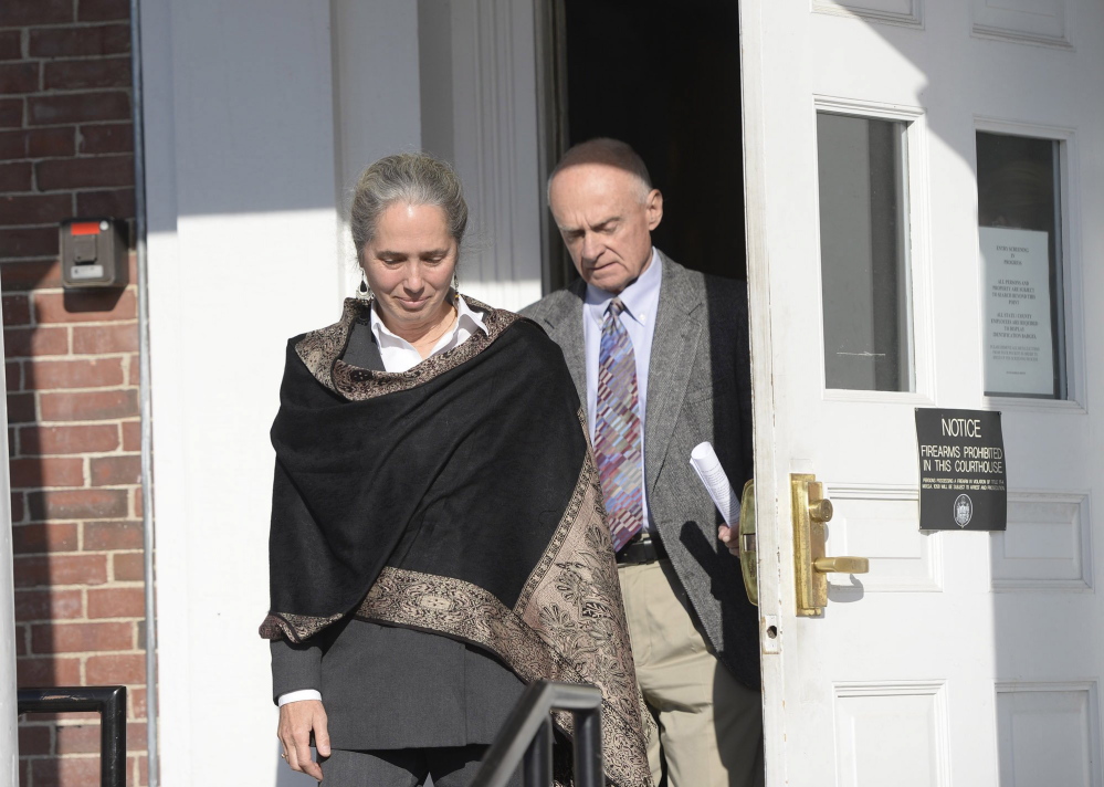 Jan Collins and Irving Faunce, adoptive parents of Gordon Collins-Faunce, leave York County Superior Court in 2013.