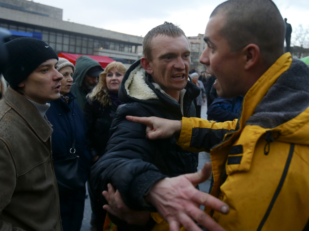 Residents debate at a central square in Simferopol, Crimea, Ukraine. Today most Crimeans see themselves as only nominally Ukrainian and Russian is, by far, the dominant language.
