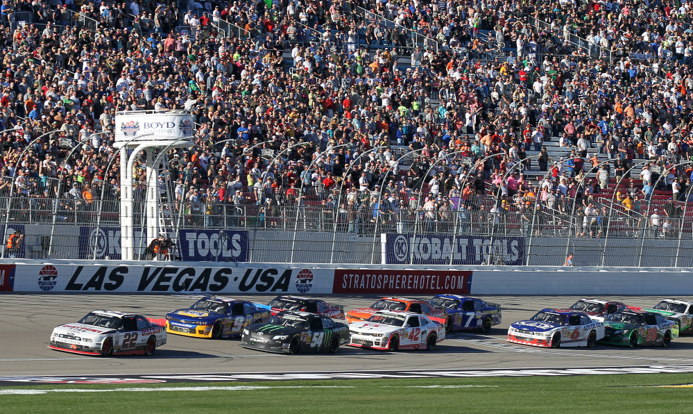 Brad Keselowski (22) leads as drivers take the green flag following a caution period during the NASCAR Nationwide Series auto race Saturday in Las Vegas.