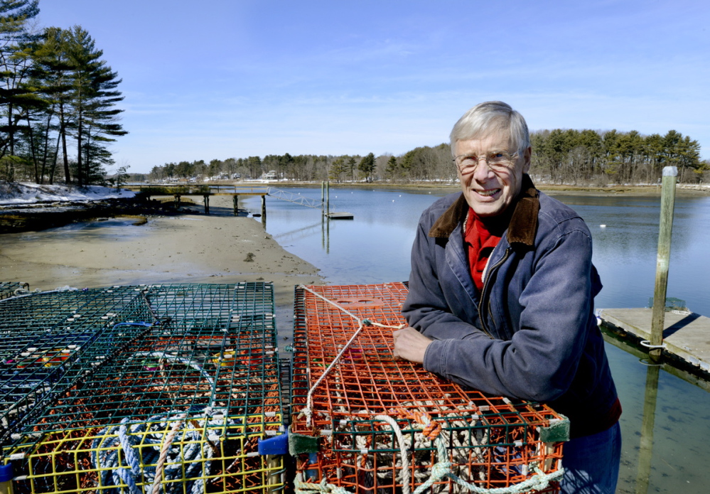 Lobsterman Pat White on his pier along the York River in York is part of a group of residents pushing for studies of the river for a Wild and Scenic Partnership River designation.