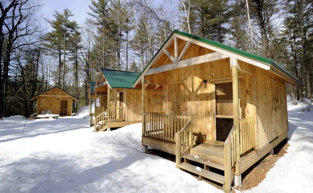 National Guard units from as far away as Portland, Ore., will begin upgrading facilities at Camp Hinds in Raymond next month, including building more cabins like these.