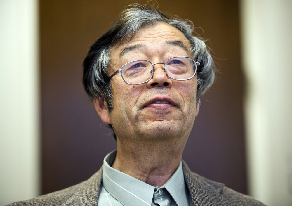 Dorian S. Nakamoto , the man identified by Newsweek as Bitcoin’s founder, talks with reporters March 6. He claims he has nothing to do with Bitcoin.