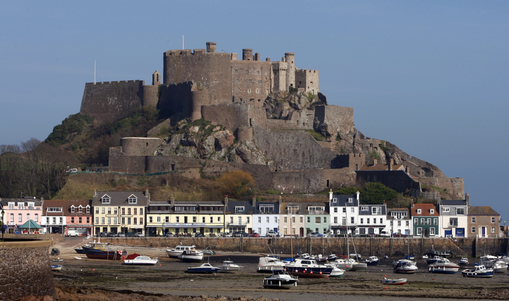 Mont Orgueil Castle rises on Jersey, one of the British Channel Islands, which is an offshore tax haven.
