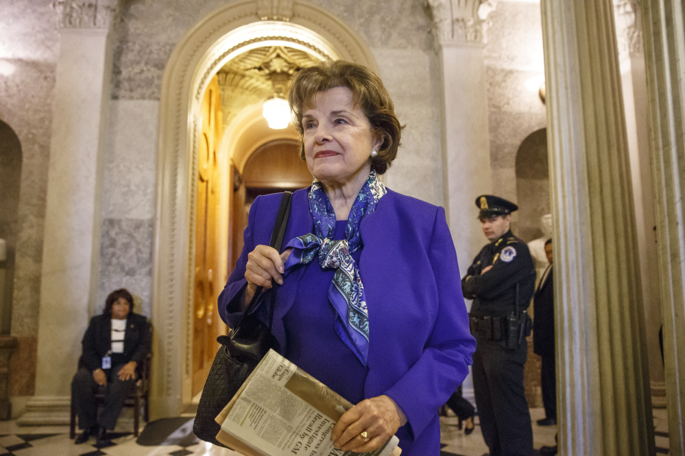 Senate Intelligence Committee Chair Sen. Dianne Feinstein, D-Calif., leaves the Senate chamber on Capitol Hill Tuesday after saying that the CIA’s improper search of a stand-alone computer network established for Congress has been referred to the Justice Department.