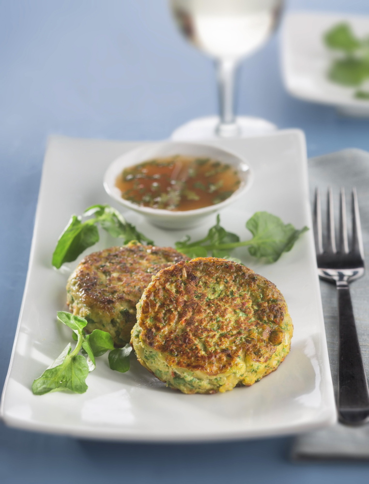 Spicy fish cakes with zesty citrus sauce and a salad make a flavorful and light Lenten meal.