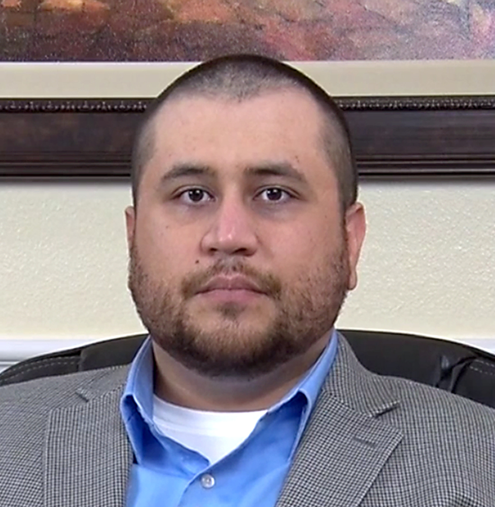 George Zimmerman looks at the video camera while taping an interview with his lawyers on Wednesday.