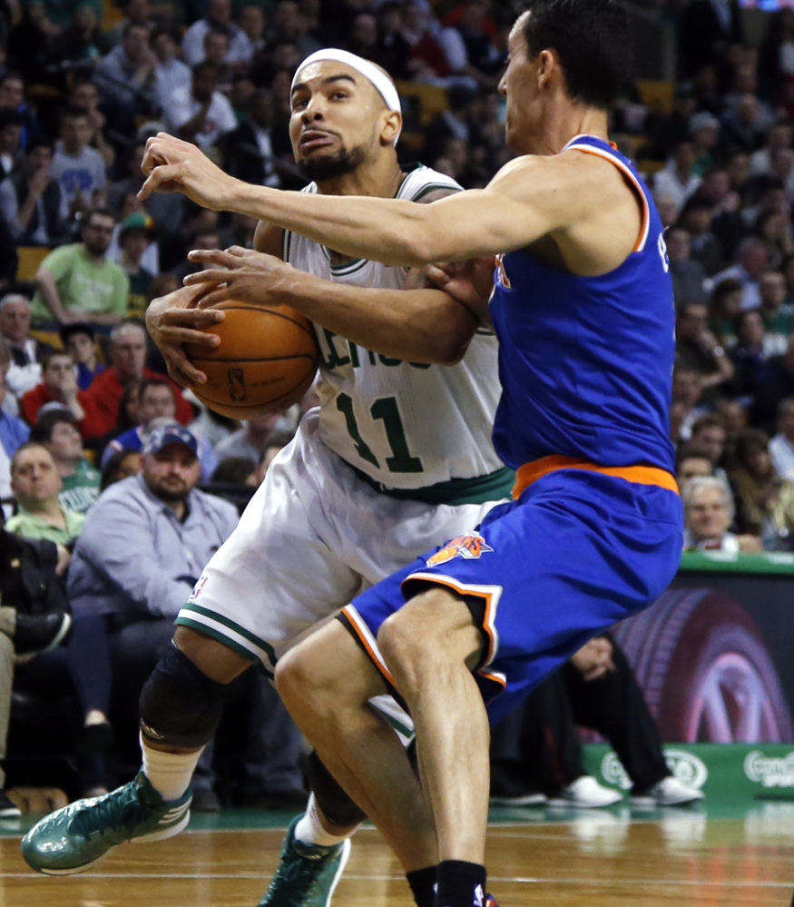 Jerryd Bayless of the Celtics drives against New York Knicks guard Pablo Prigioni in Wednesday night’s game at TD Garden in Boston. The Knicks won their fifth straight, 116-92.