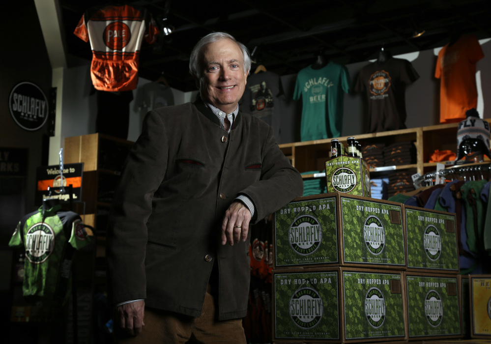 Tom Schlafly, co-founder of the brewery that produces the Schlafly brand of beers, stands in the gift shop at Schlafly Bottleworks in Maplewood, Mo.
