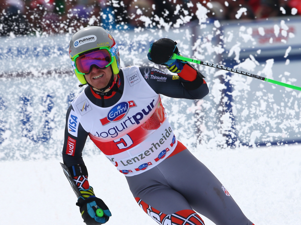 Ted Ligety of the United States celebrates at the finish area after winning the men’s giant slalom at the World Cup finals in Lenzerheide, Switzerland on Saturday.