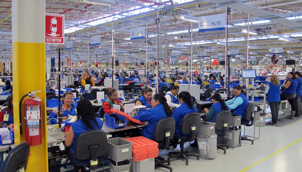 Natural light illuminates the air-conditioned assembly floor at the Plantronics headset plant in Tijuana, Mexico, where occasional theater, dance and music performances enliven the workday. The factory has been named the best place to work in Mexico three years in a row.