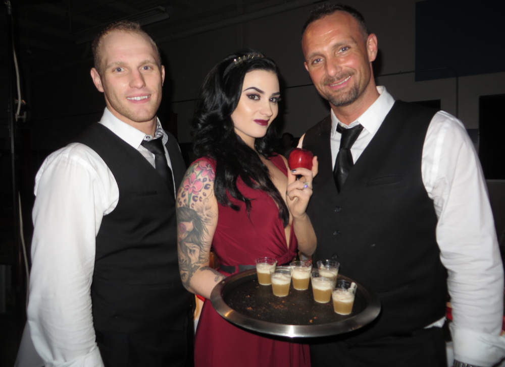 Steve Murray, Jessica Candage and Joshua Miranda, representing Top of the East, tempt guests with Snow White’s Poison, the People’s Choice award-winning cocktail at the Maine Restaurant Week Signature Event in Scarborough last Sunday night.