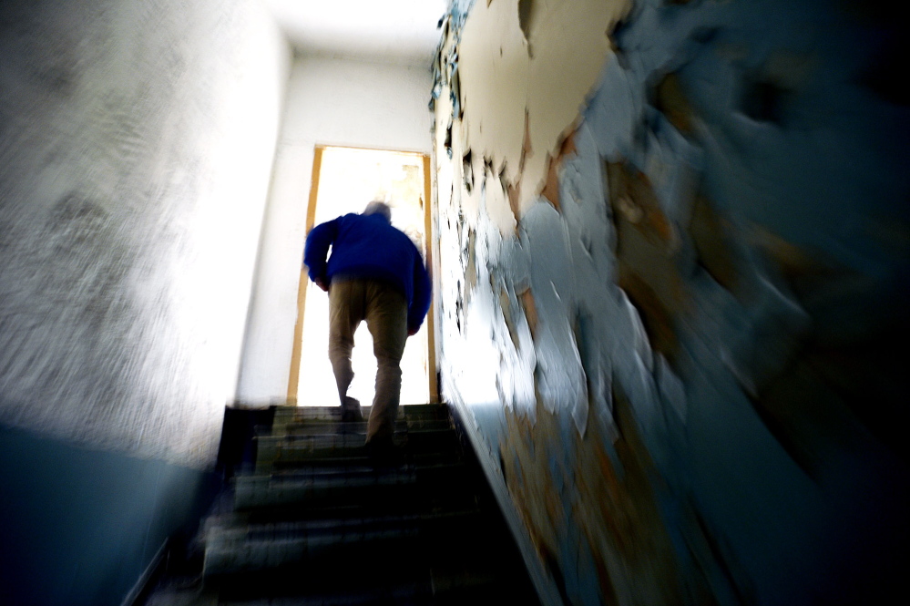 Don Gean of the York County Shelter Program walks up the stairway in the old jail in Alfred where he began his work with southern Maine’s homeless, spending the next decades finding innovative ways to address all their needs.