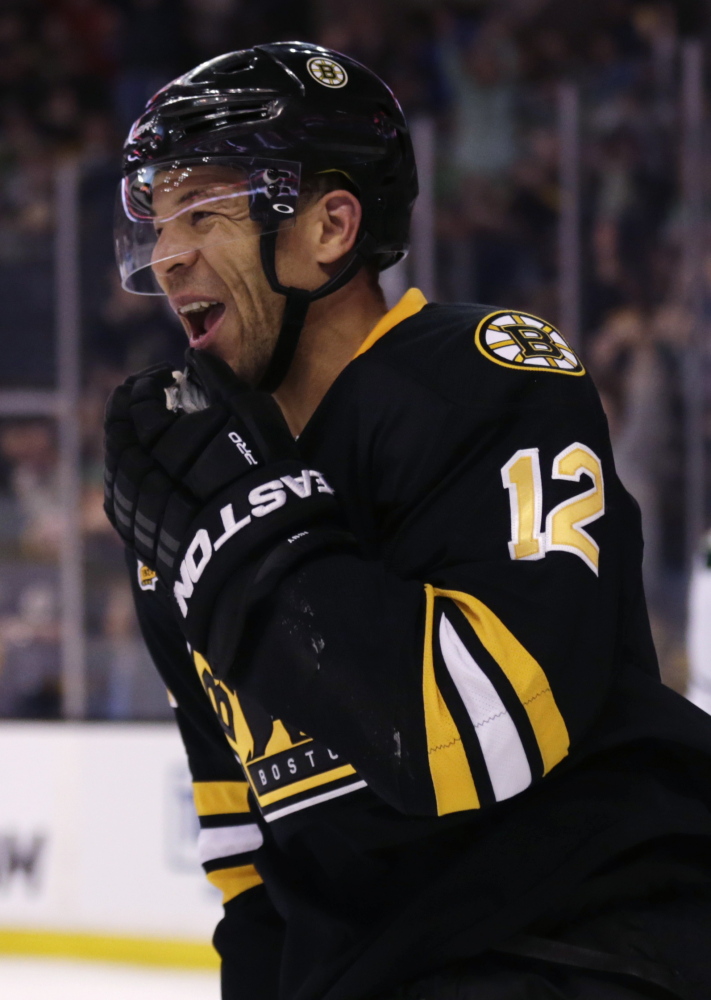 Boston’s Jarome Iginla is all smiles after the first of his two goals in Monday night’s 4-1 victory over the Minnesota Wild.