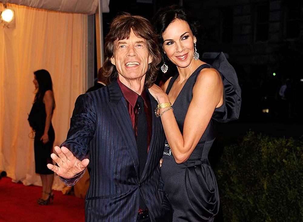 Singer Mick Jagger and L’Wren Scott attend an event in New York. Scott, a fashion designer, was found dead Monday in Manhattan of a possible suicide.