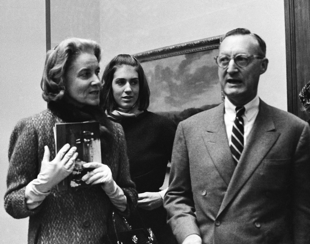 Paul Mellon, his wife Rachel “Bunny” Mellon and stepdaughter Eliza Lloyd attend a preview of the Mellon collection of English Art at the Royal Academy in London on Dec. 11, 1964. The Mellons were avid art collectors.