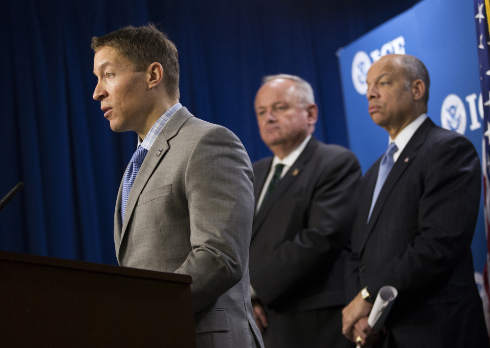 Daniel Ragsdale, left, deputy director of U.S. Immigration and Customs Enforcement, discusses the results of an international investigation of a child pornography website.