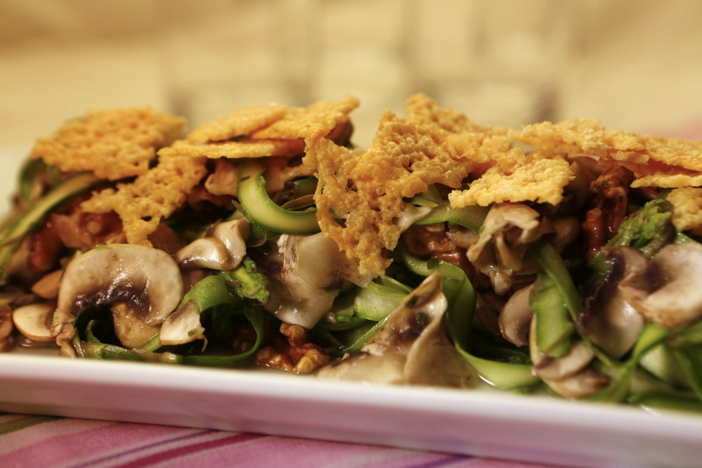 Shaved asparagus with mushrooms and Parmesan crumble is a favorite aspargus-inspired dish.
