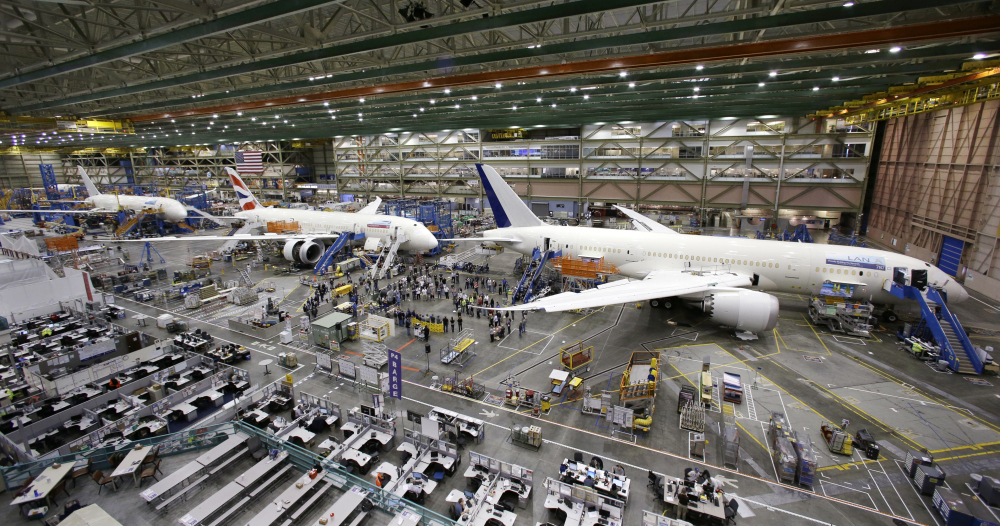 A line of Boeing 787 jets sits on the floor nearing completion at the company’s production plant in Everett, Wash., in May 2013.