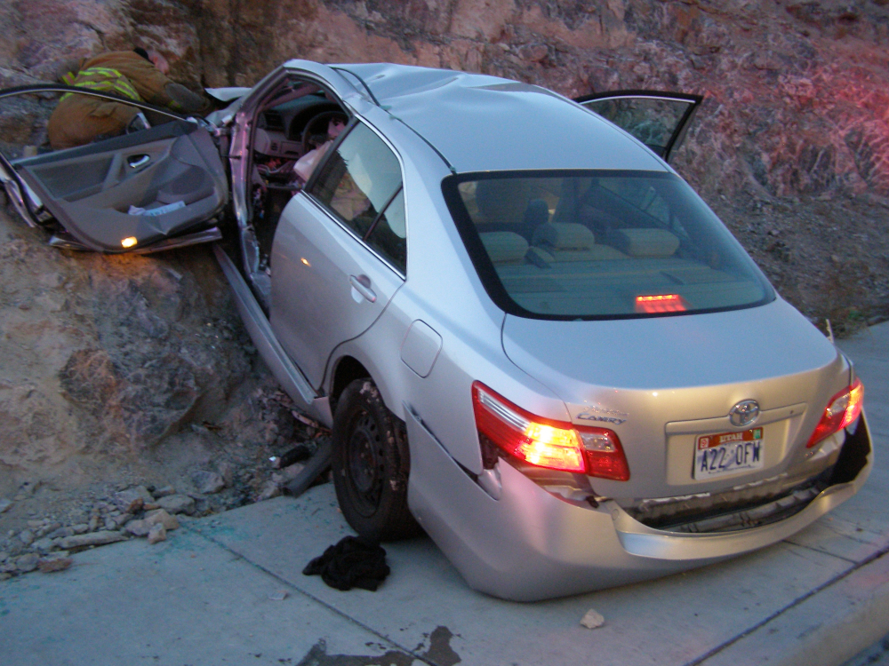 A Toyota Camry is shown after it crashed as it exited Interstate 80 in Wendover, Utah, in this Nov. 5, 2010, photo released by the Utah Highway Patrol. Police suspected problems with the Camry’s accelerator or floor mat caused the crash that left two people dead and two others injured.