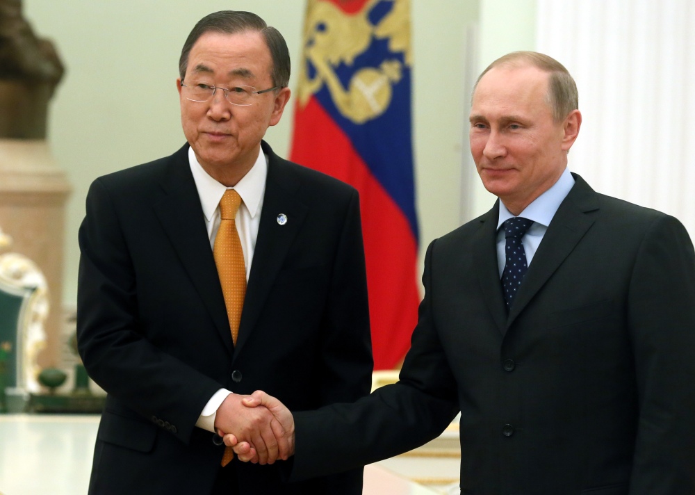 United Nations Secretary General Ban Ki-moon, left, shakes hands with Russian President Vladimir Putin during a meeting in Moscow’s Kremlin Thursday.