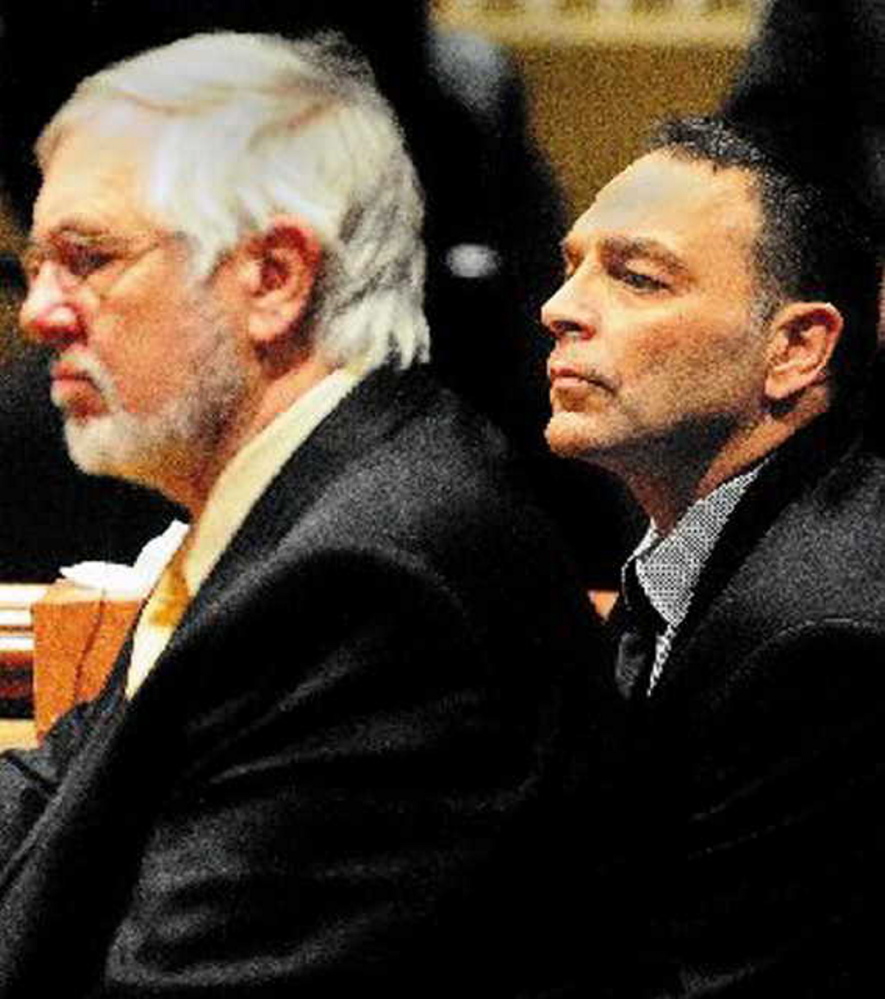 Andrews Campbell, left, the defense attorney for Raymond Bellavance Jr., listens to the verdict as a jury in 2011 finds Bellavance guilty of arson related to a 2009 fire that destroyed the Grand View Topless Coffee Shop in Vassalboro.