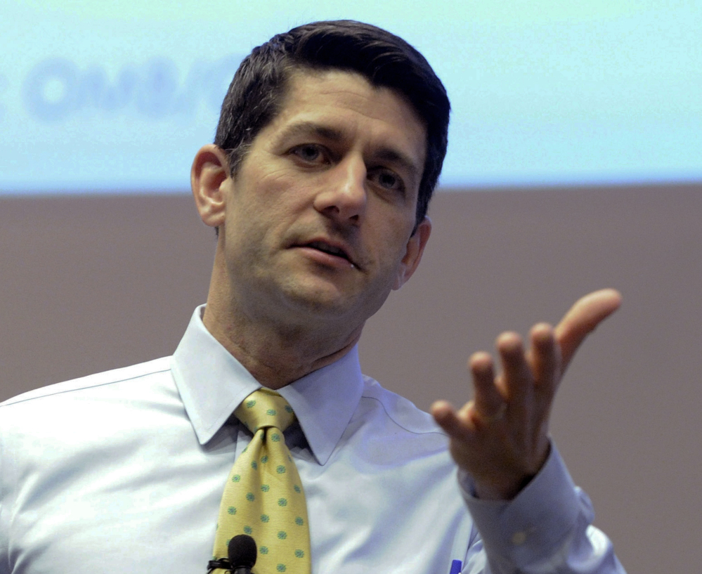 Rep. Paul Ryan, R-Wis., answers constituents’ questions at the Snap-on Headquarters in Kenosha, Wis. His remarks last week about inner-city poverty brought accusations of racism.