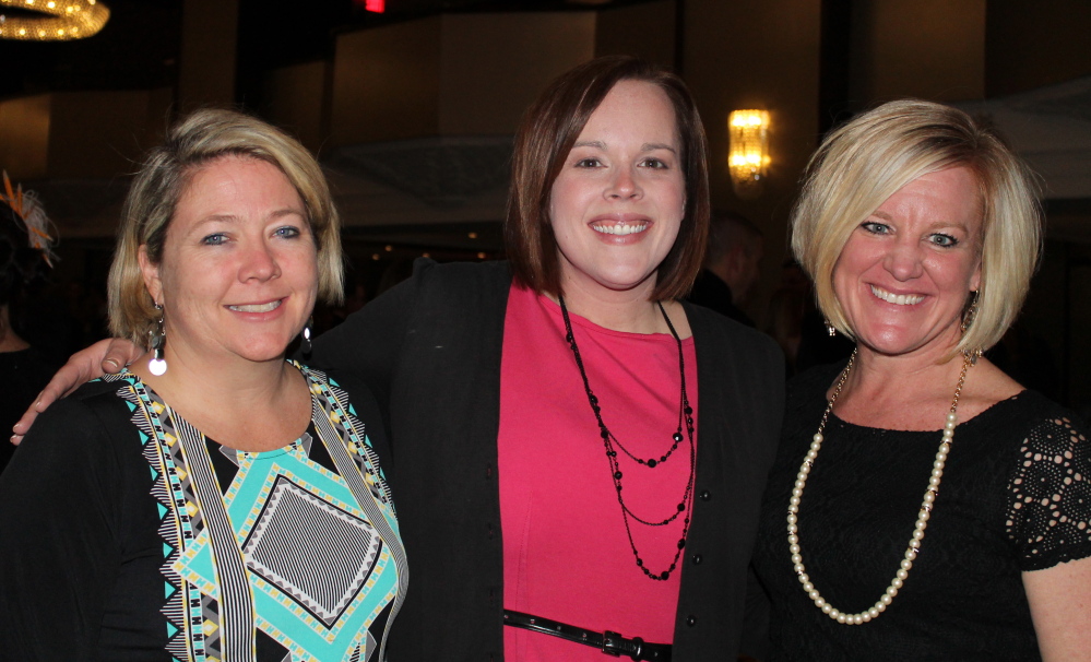 Junior League board member Kate Anderson, left, with Laura Heckman of Unum and Amy Cunniffe of Lincoln Financial Group.