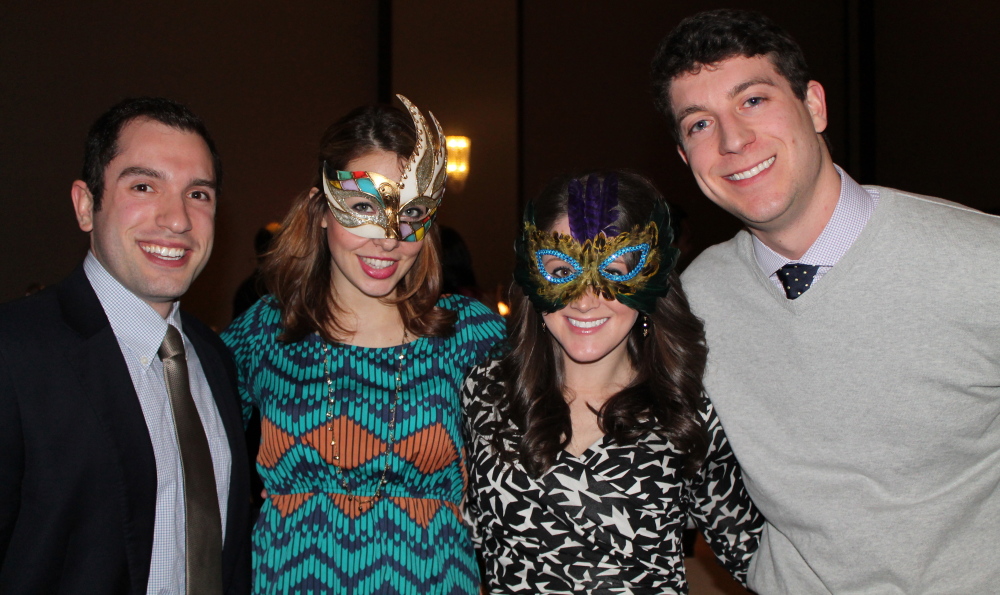 Brandon Rubenstein, left, of CogSports, Aly Myles of WMTW-8, Virginia Templet of Puritan Medical Products and Jeffrey Lewis of Key Bank at the recent Freeze Out Hunger gala at the Westin Portland Harborview Hotel.