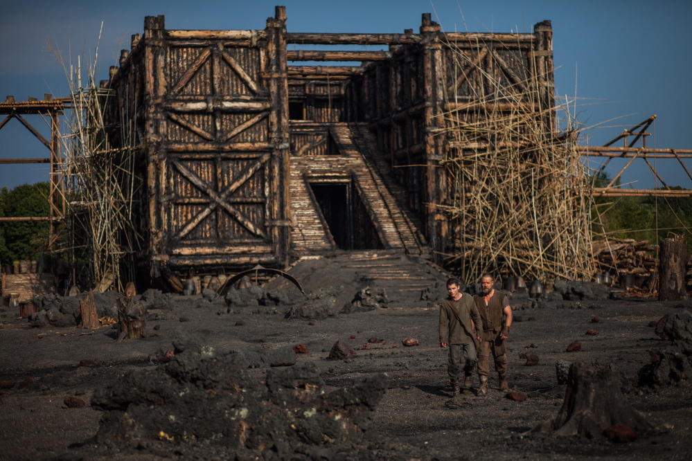 Logan Lerman, left, and Russell Crowe in a scene from “Noah.” The movie has sparked controversy among some conservative Christians in the U.S., who object to its interpretation of the Bible story, and among some Muslims who say it contradicts a generally agreed upon taboo in Islam by depicting a prophet.