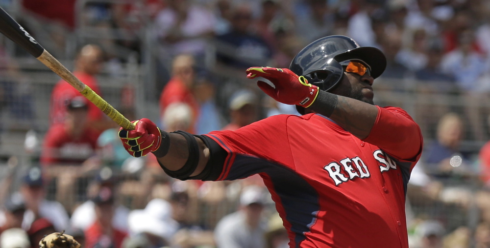 Boston Red Sox designated hitter David Ortiz bats in the third inning of an exhibition baseball game against the Tampa Bay Rays in Fort Myers, Fla., on Sunday.