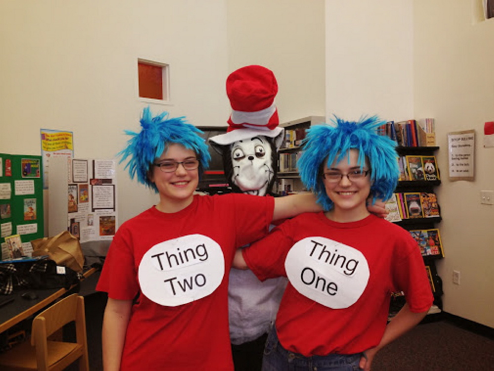 Wells-Ogunquit Community School District students Bethany and Sarah Berger dressed as The Cat in the Hat characters Thing One and Thing Two during a recent Reading Celebration Day at Wells Elementary School. At center, dressed as the Cat in the Hat is Nancy Cotty.