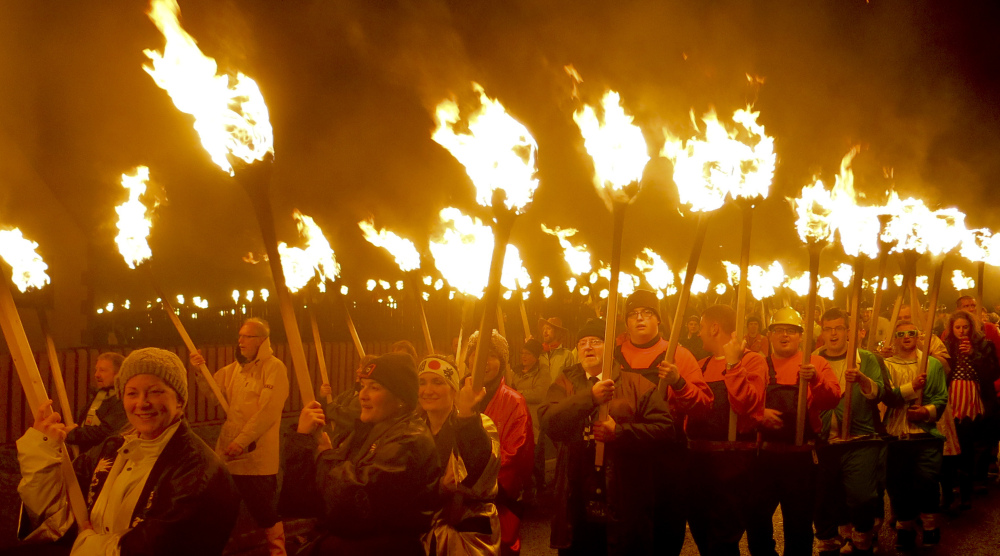 Locals dressed as Vikings carry torches in the annual Up Helly Aa, the Viking fire festival in Gulberwick, Shetland Islands, north of mainland Scotland. They live in the remote archipelago where many claim descent from Scandinavian raiders.