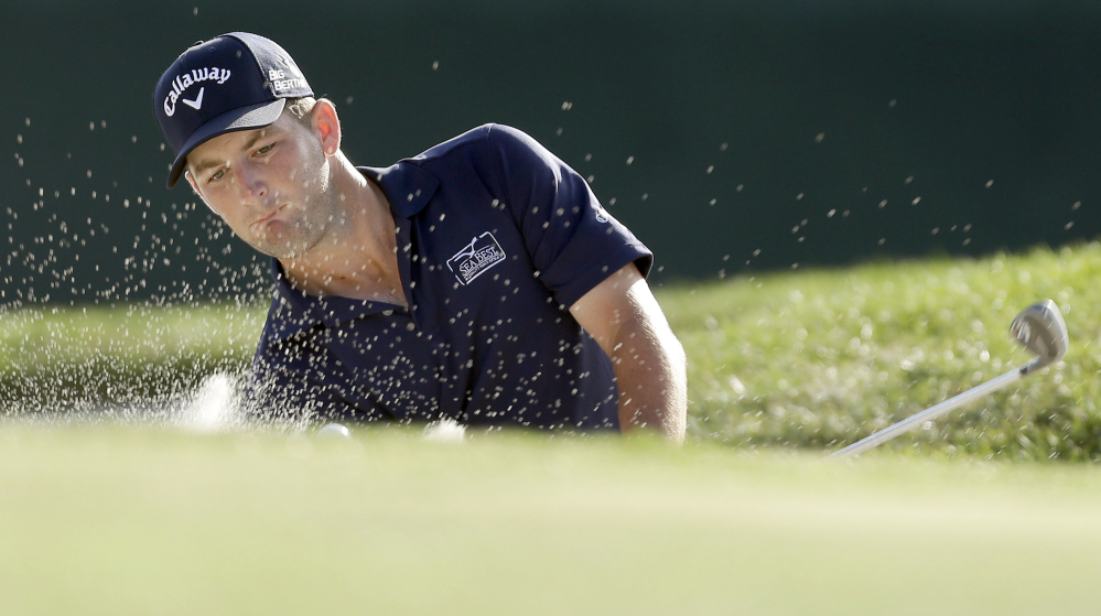 Matt Every blasts out of the sand trap on the 17th hole during the final round of the Arnold Palmer Invitational golf tournament at Bay Hill in Orlando, Fla., for his first PGA victory in 92 attempts.