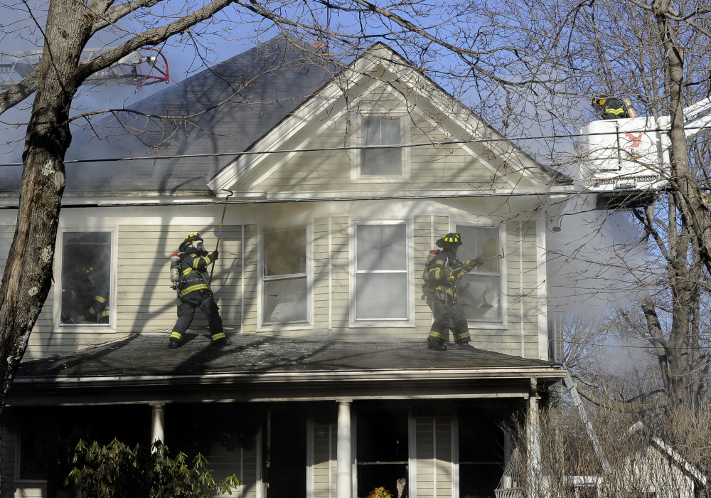 Portland firefighters battle a house fire at 38 Columbia Road in Portland.