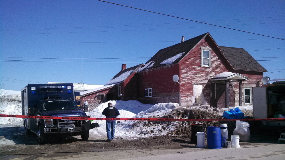 Police investigate a suspected meth lab in Hodgdon on Tuesday.