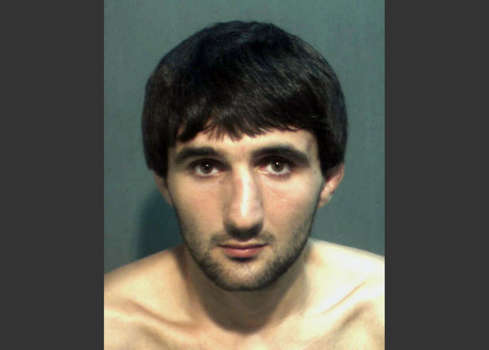 This file photo provided by the Orange County Corrections Department in Orlando, Fla., shows Ibragim Todashev after his arrest for aggravated battery in Orlando.