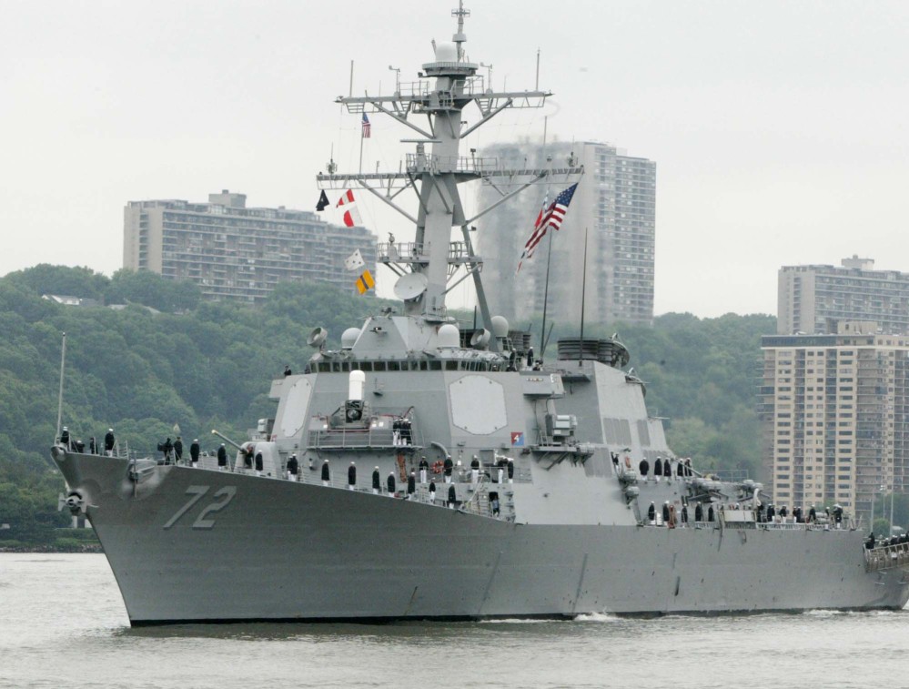 The USS Mahan, a guided-missile destroyer, moves up the Hudson River in New York. A sailor was fatally shot aboard the USS Mahan at Naval Station Norfolk late Monday.