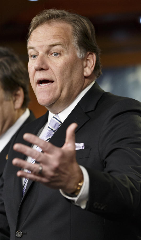 House Intelligence Committee Chairman Rep. Mike Rogers, R-Mich., talks to reporters Tuesday about proposed changes to the National Security Agency's program of sweeping up and storing vast amounts of data on Americans’ phone calls.