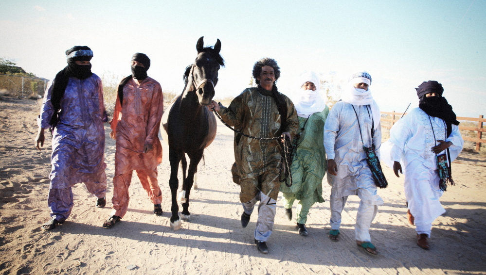 Tinariwen’s music is influenced by their region in Africa and by Western musicians like Jimi Hendrix.